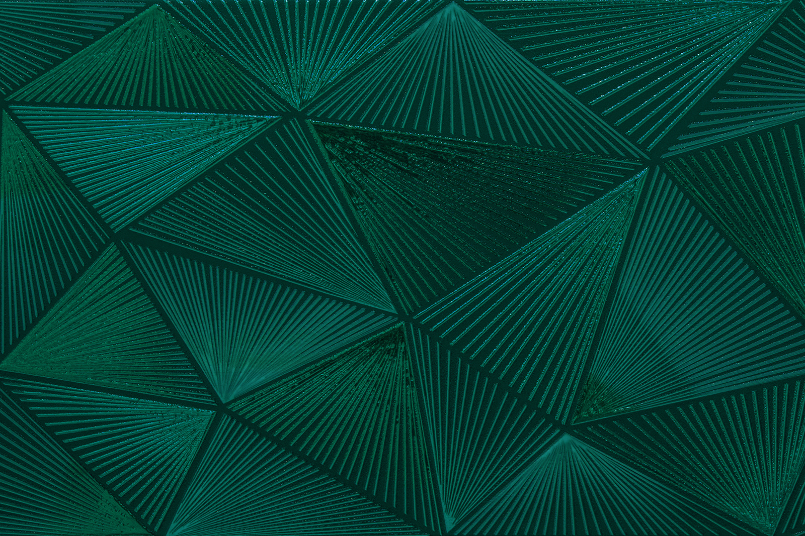 Green triangle pattern on a green surface