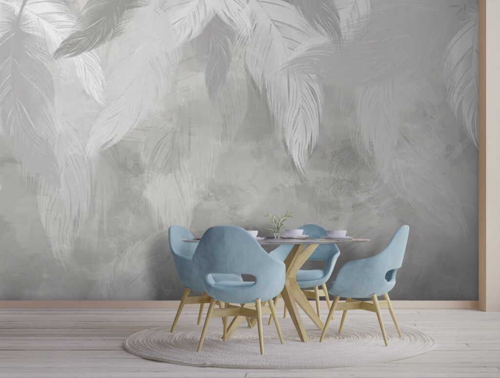 White feather on a grey surface White feather on a grey surface