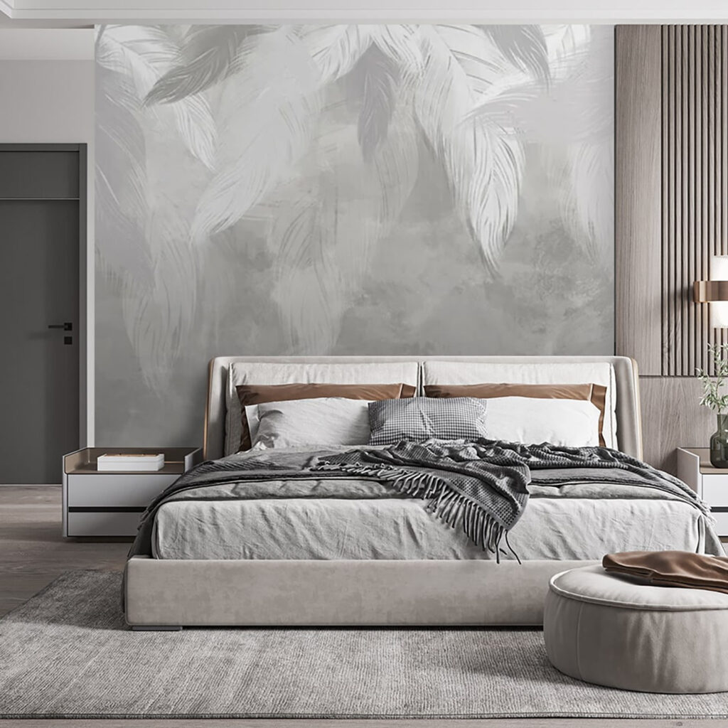 White feather on a grey surface White feather on a grey surface