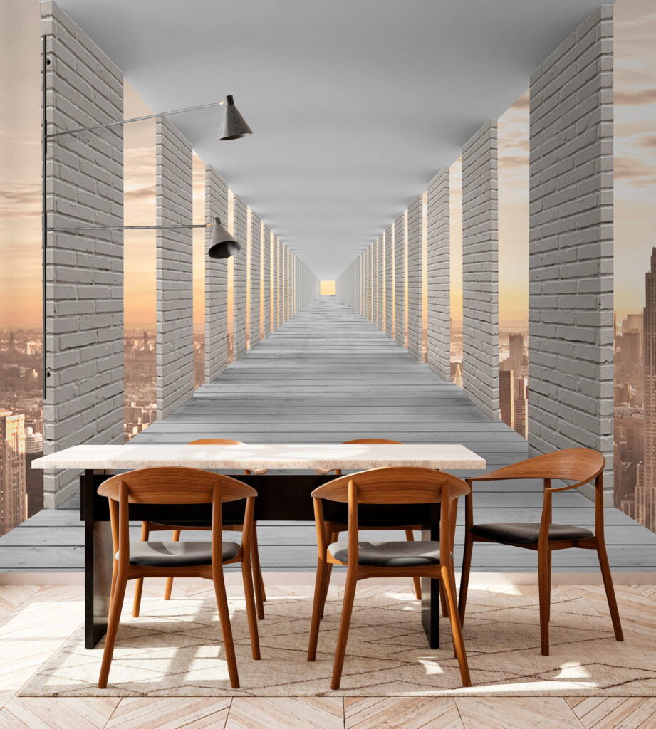 Long walkway with pillars and a city in the background