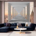 Fototapeta Dlouhý chodník se sloupy a městem v pozadí