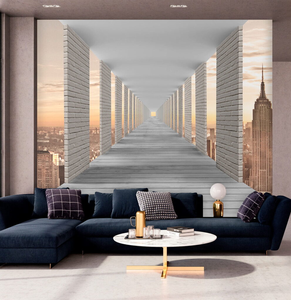 Long walkway with pillars and a city in the background