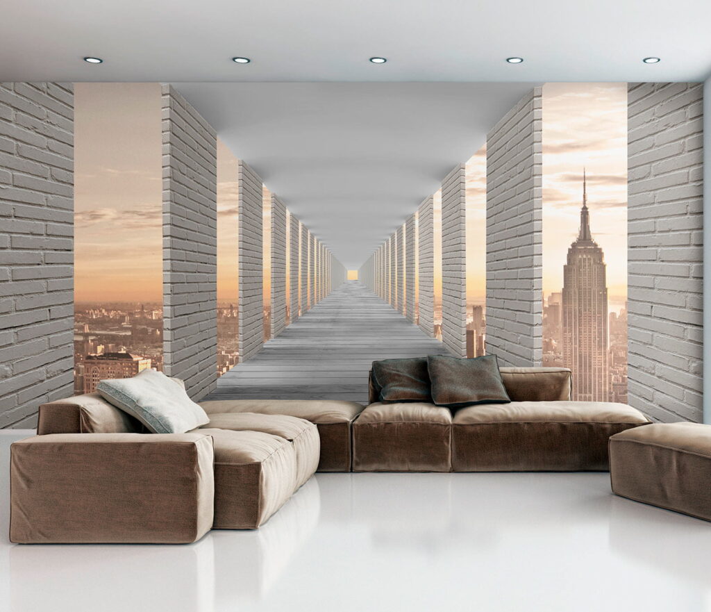 Long walkway with pillars and a city in the background