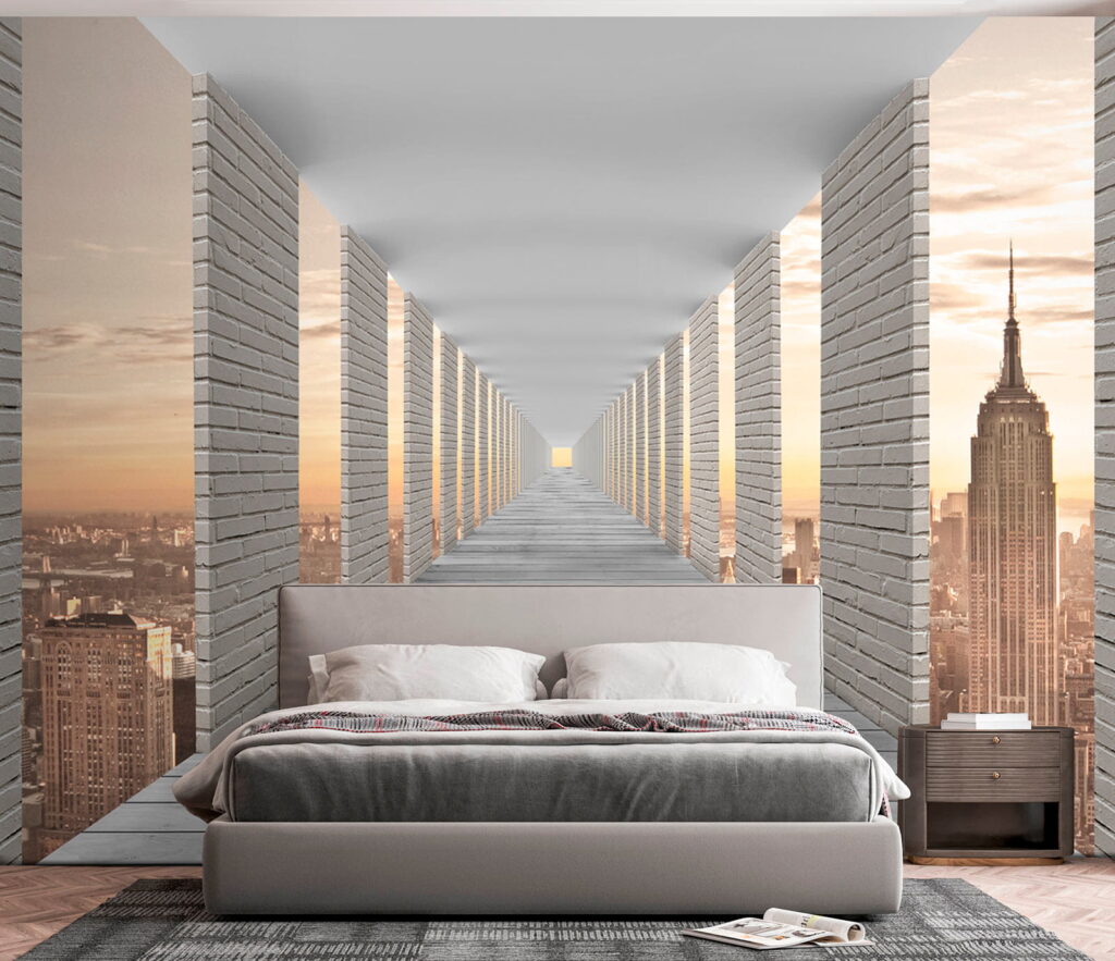 Long walkway with pillars and a city in the background