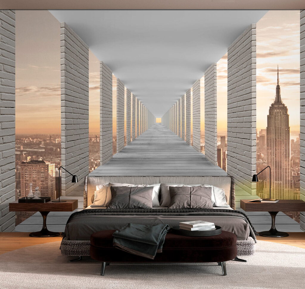 Long walkway with pillars and a city in the background