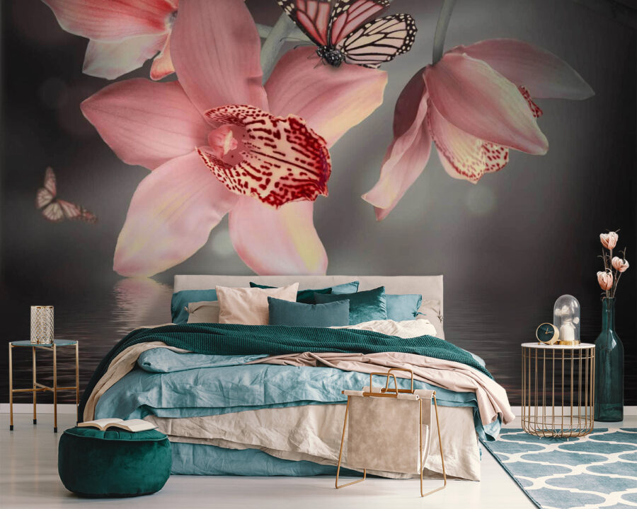 Růžové orchideje a motýli na větvi Růžové orchideje a motýli na větvi