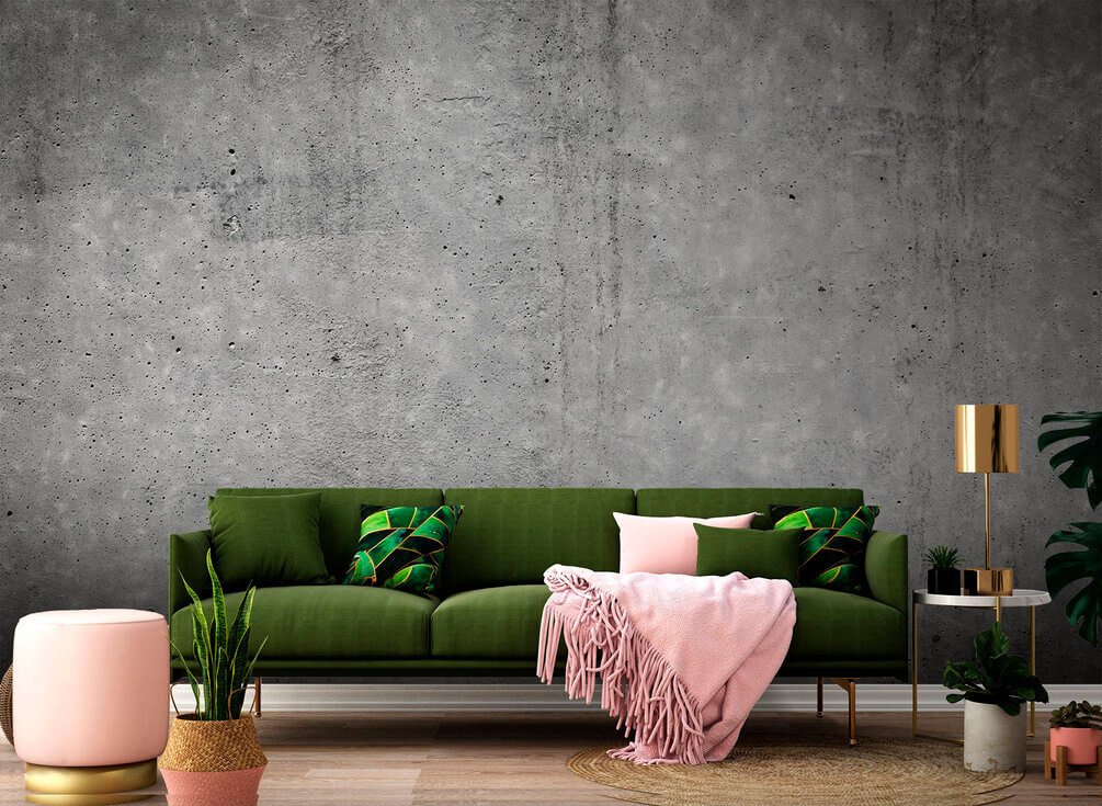 Grey concrete wall with black spots