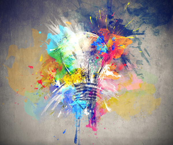 Light bulb with colorful paint splatters