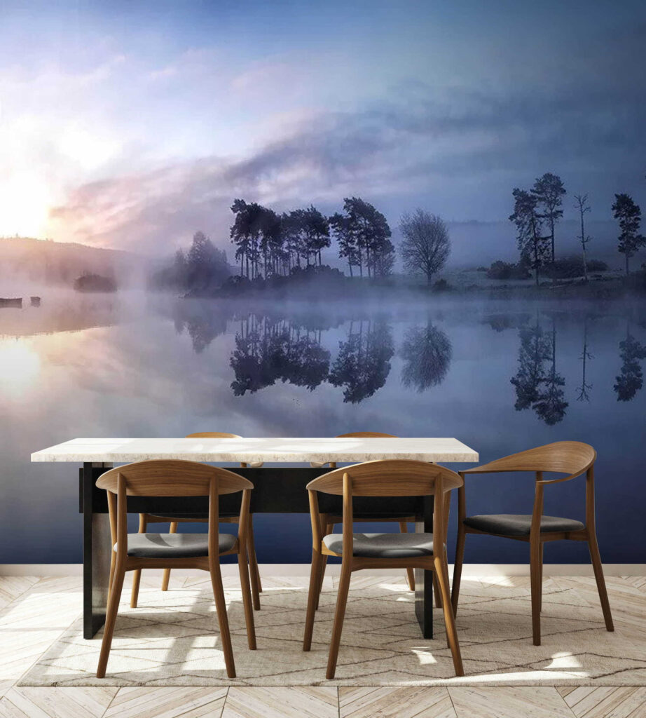 Foggy lake with trees and a blue sky