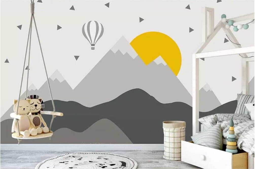 Mountain landscape with a hot air balloon and a sun