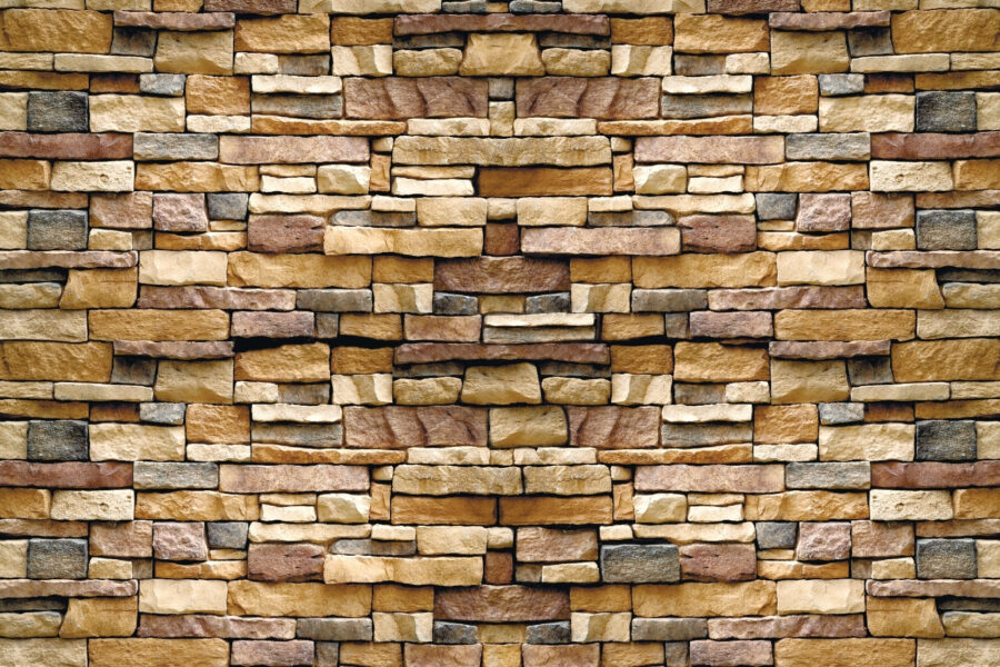 Texturovaný design kamenné stěny ve vrstvách.
