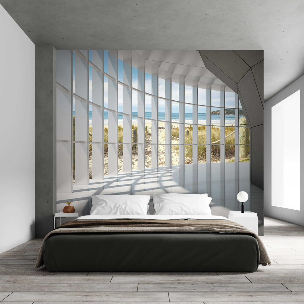 Large room with windows and a beach view