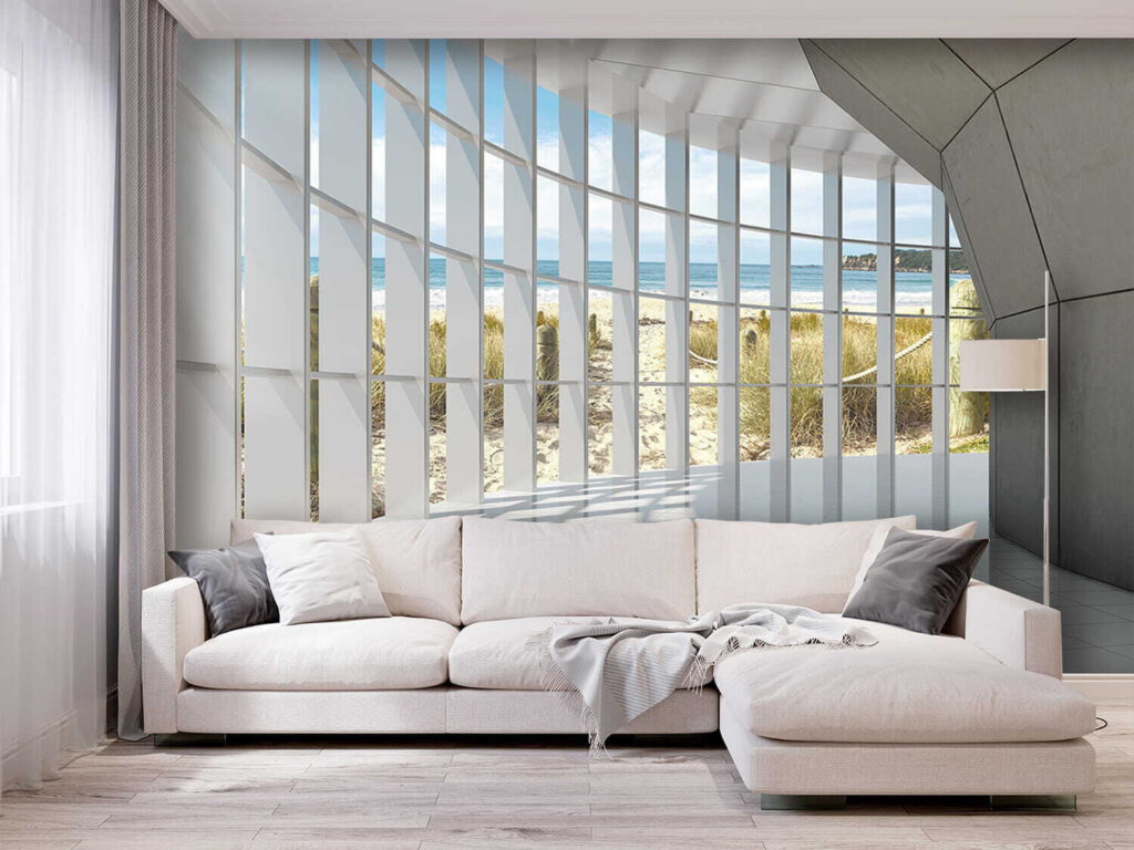 Large room with windows and a beach view