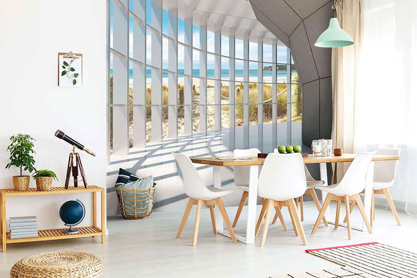 Large room with windows and a beach view