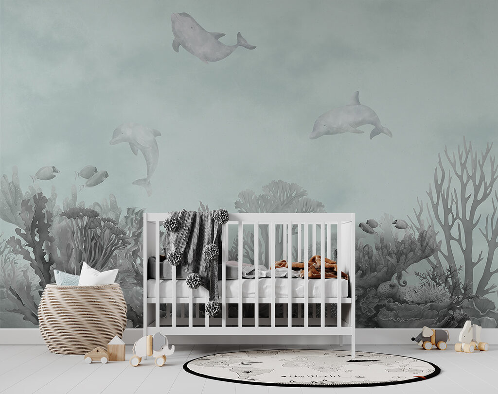 A group of dolphins swimming in the ocean A group of dolphins swimming in the ocean