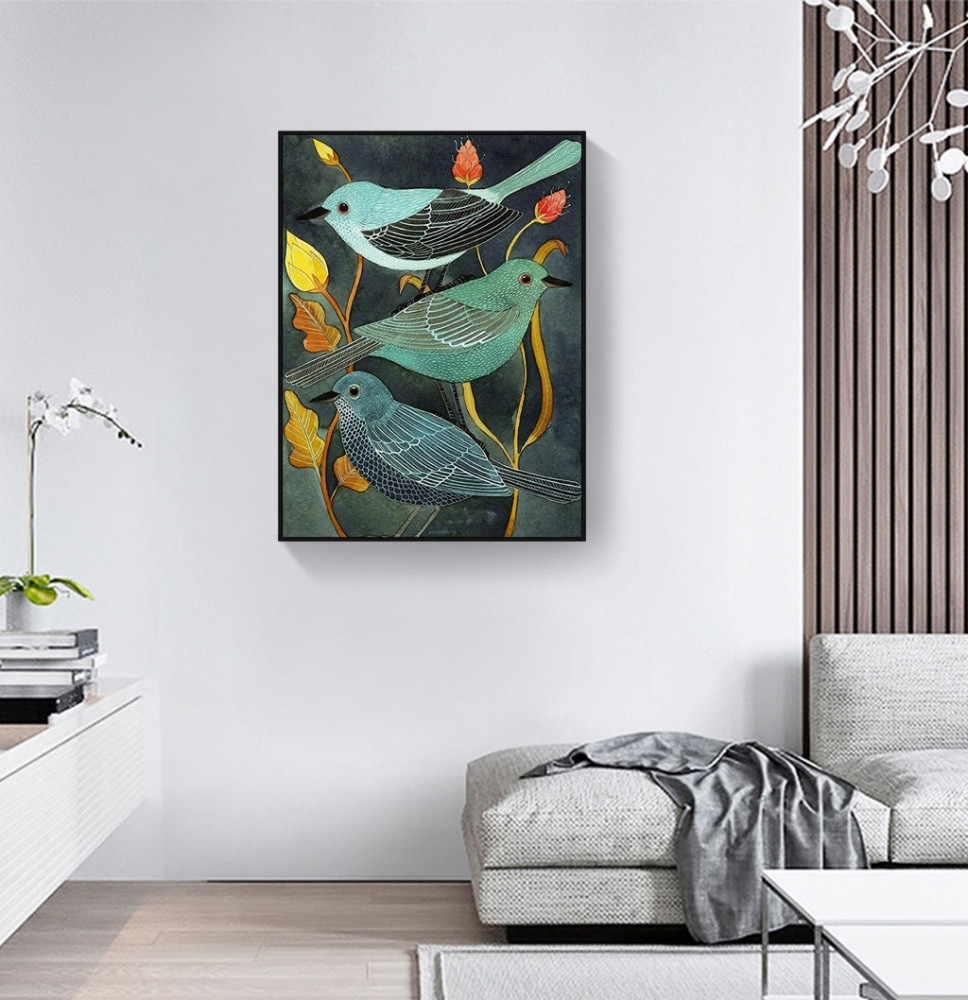 A group of birds on a plant