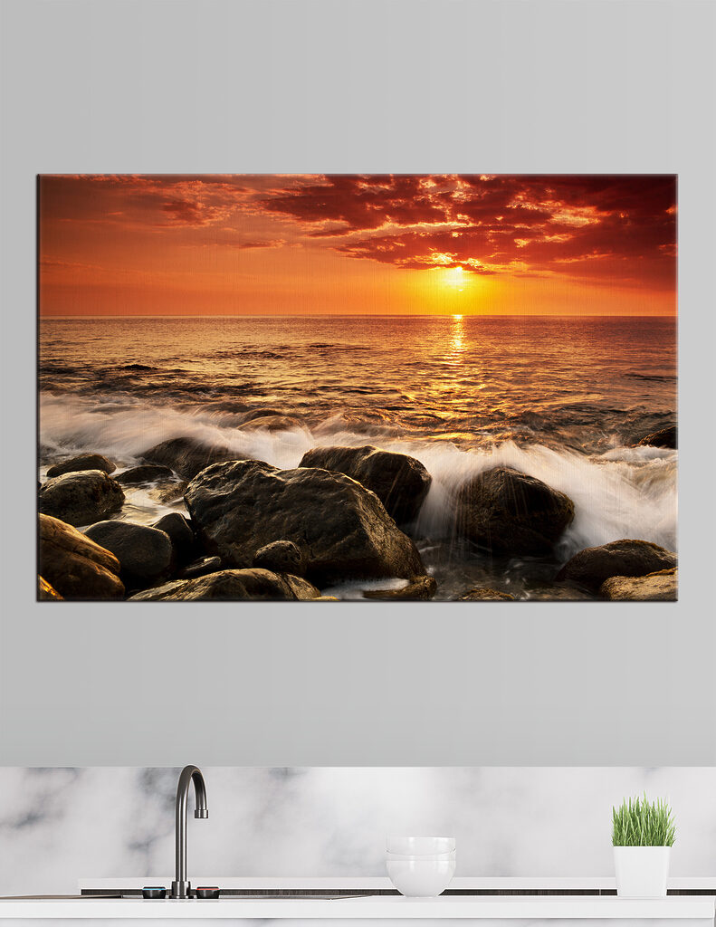 A sunset over a rocky beach A sunset over a rocky beach