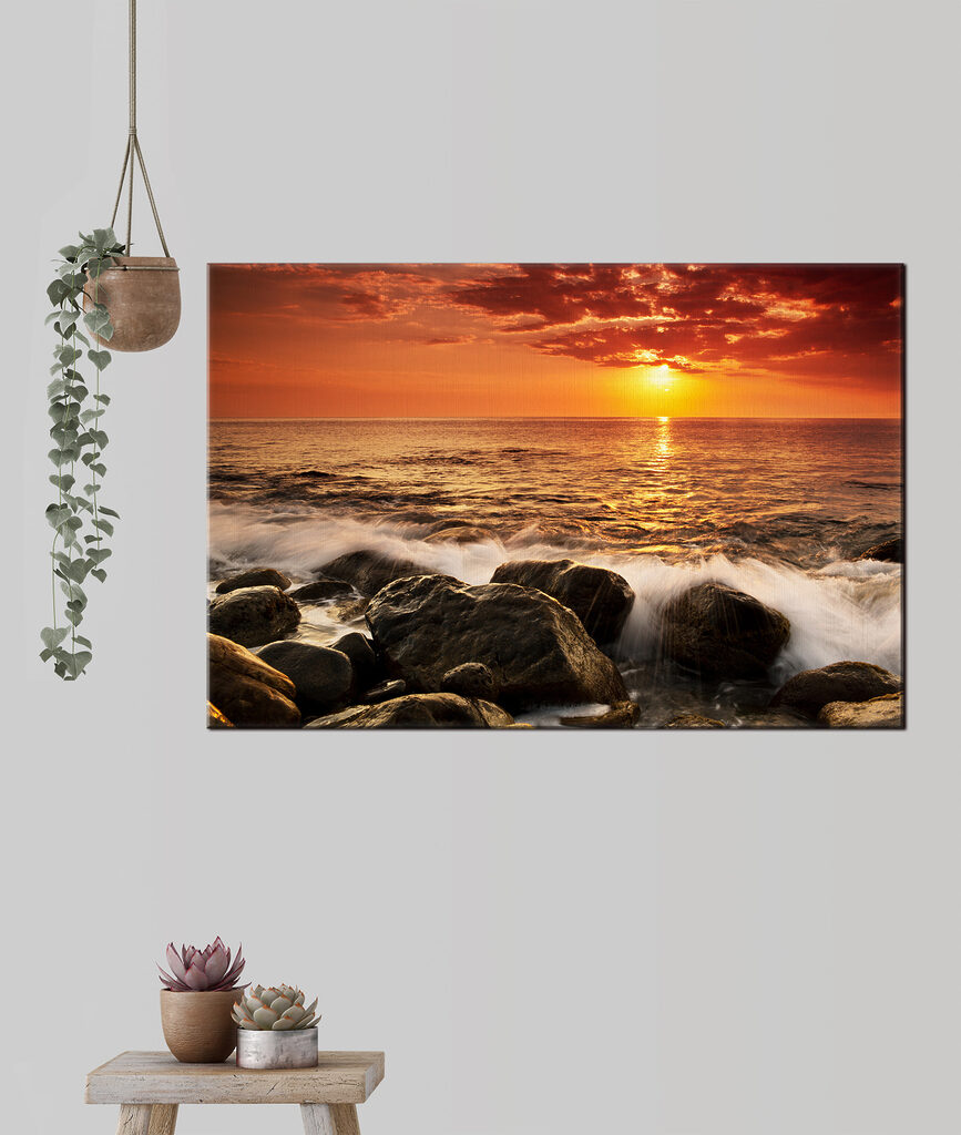 A sunset over a rocky beach A sunset over a rocky beach