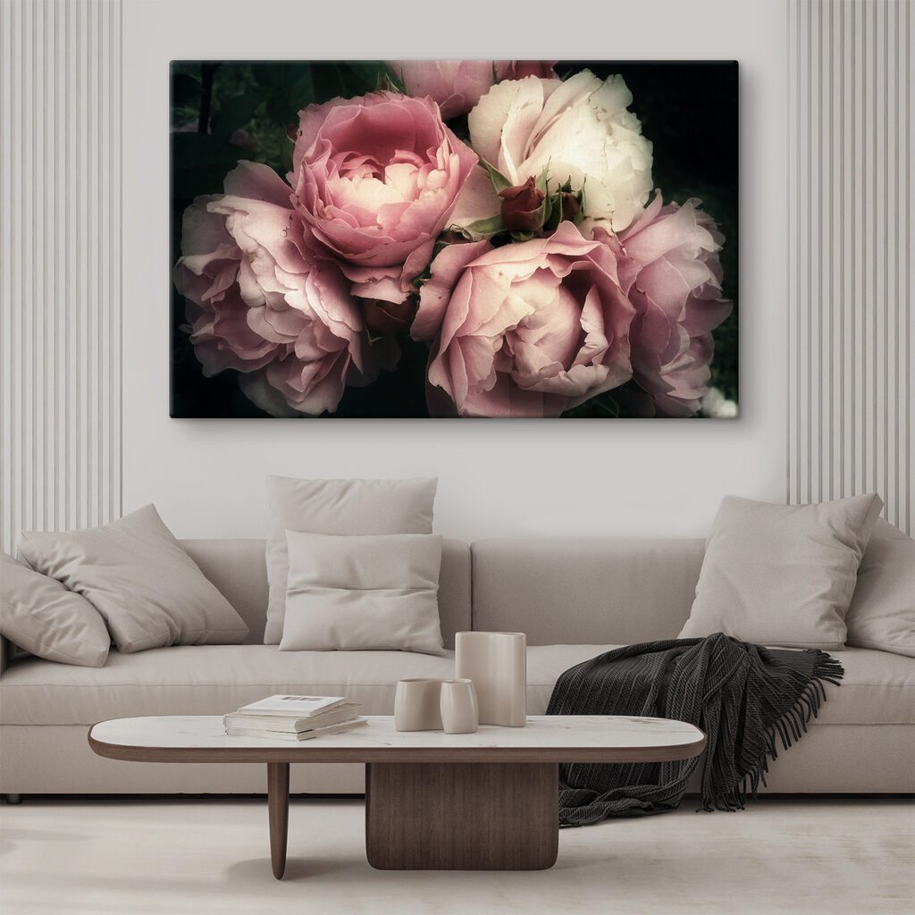 A group of pink and white roses