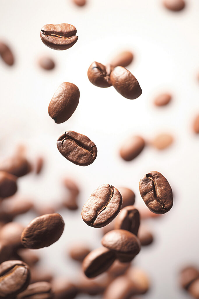 Coffee beans falling in the air