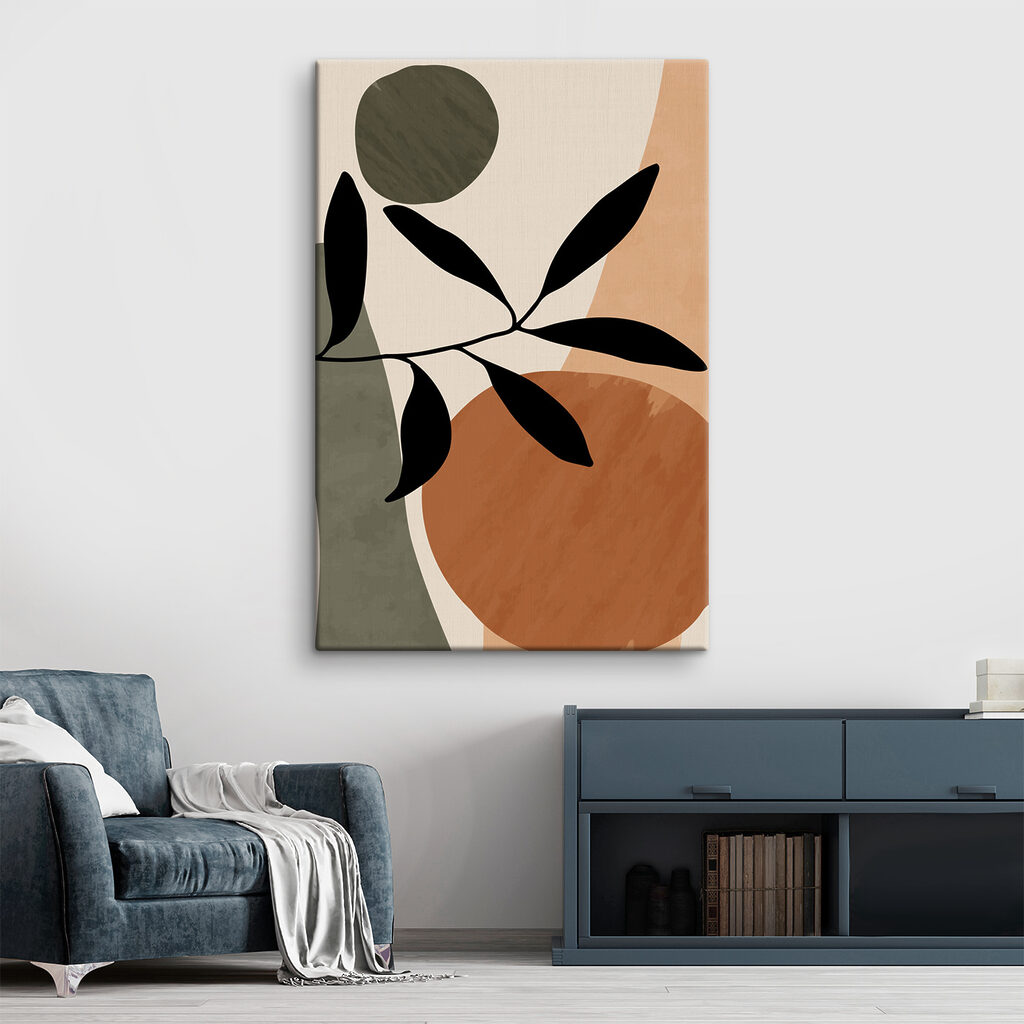 A black leaf on a branch with circles and circles