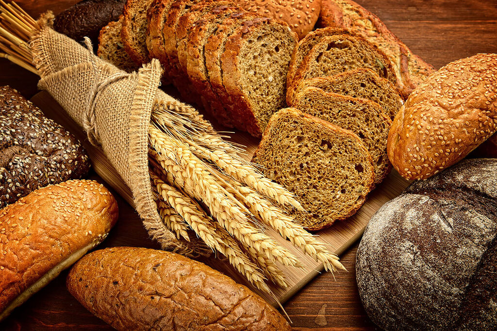 A group of bread on a cutting board