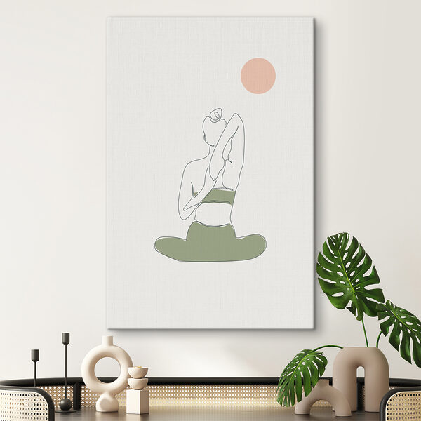 A woman sitting in yoga pose