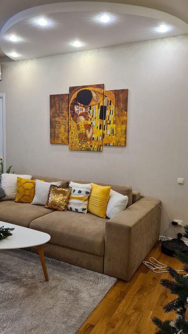 A painting of a man and woman kissing A painting of a man and woman kissing