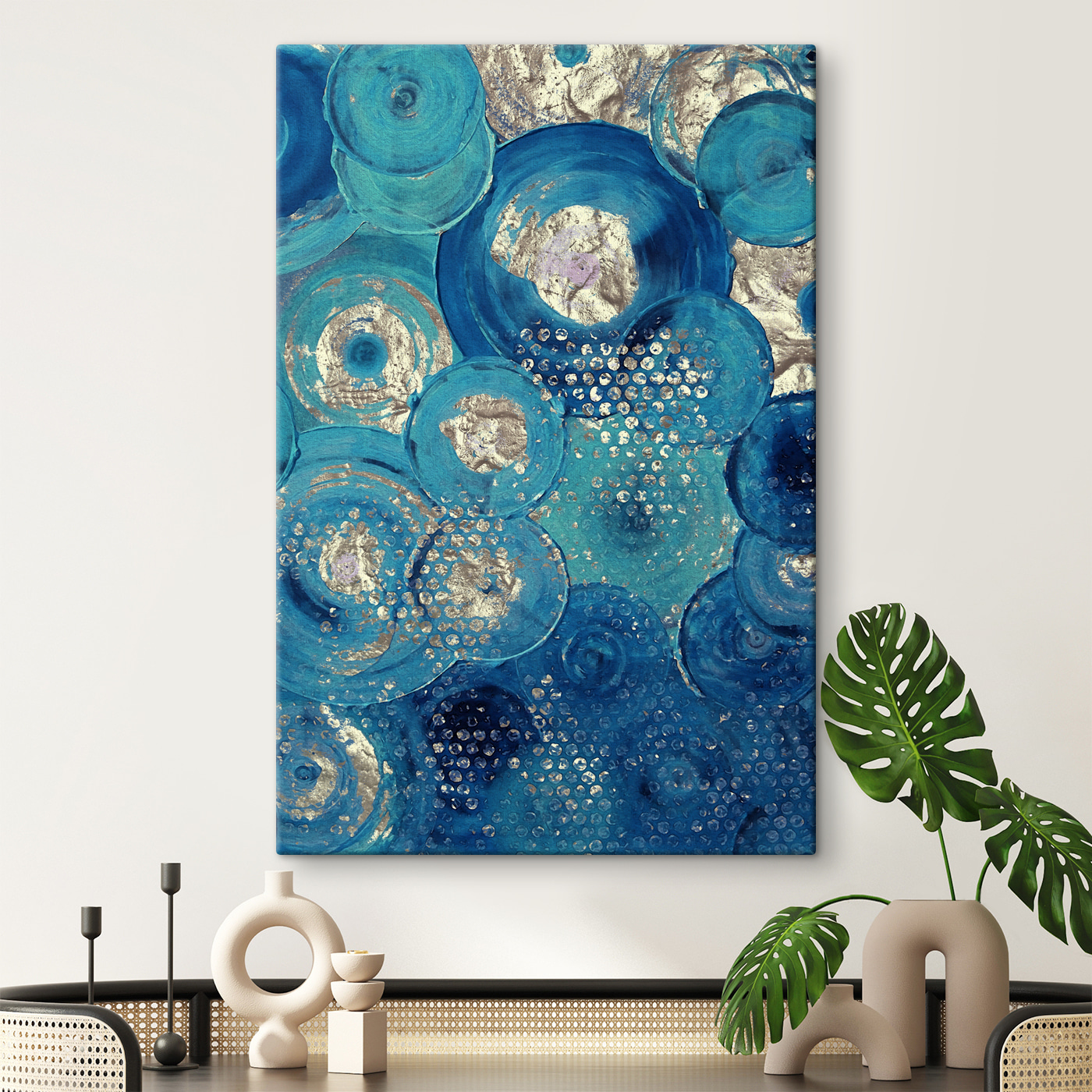 A blue and silver circle painting