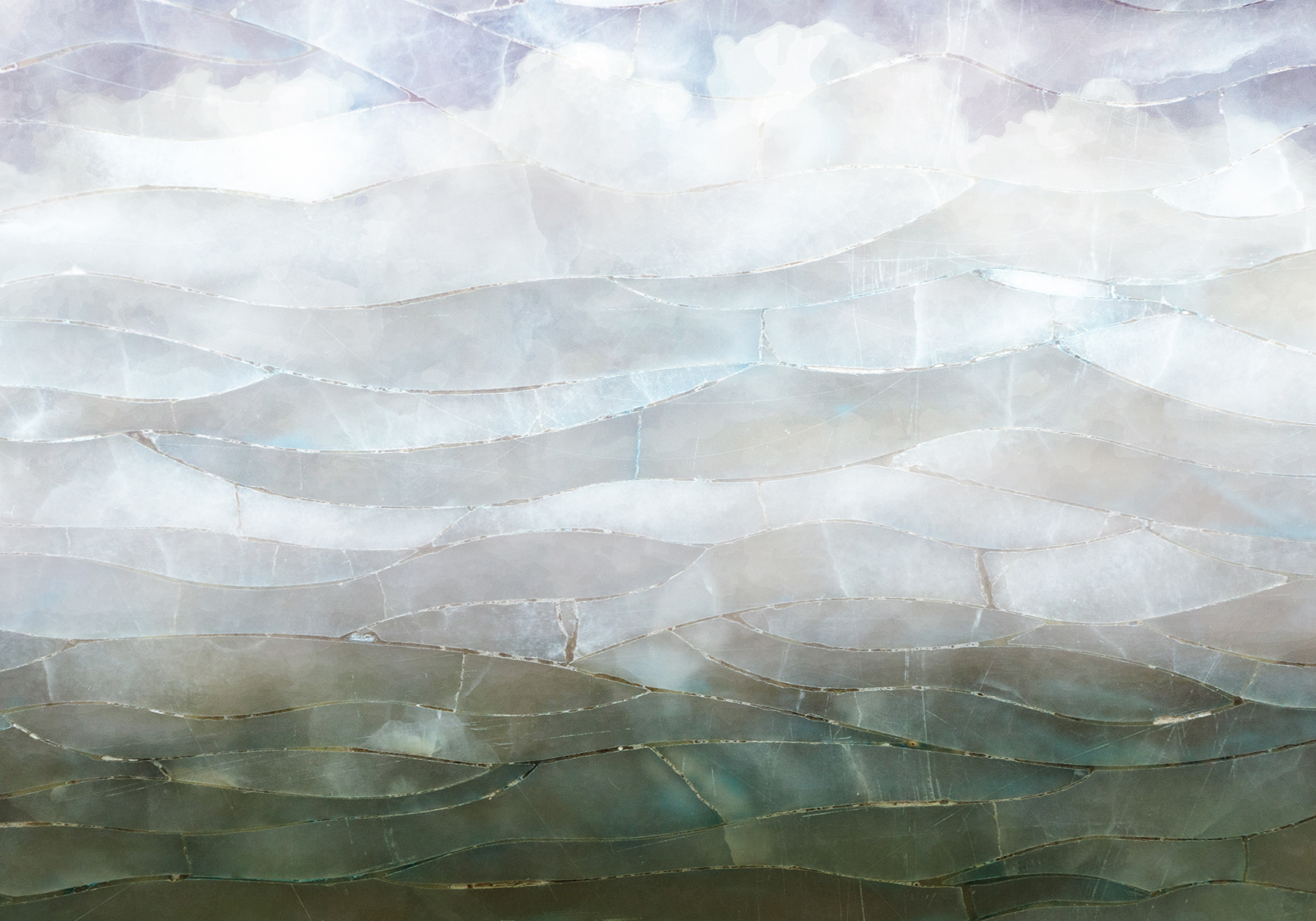 A glass with a pattern of clouds