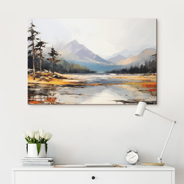 A lake with mountains in the background