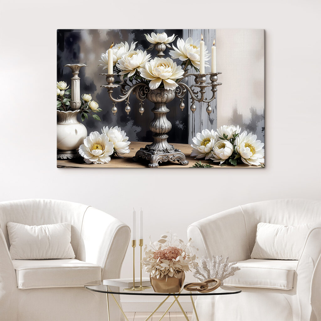 A silver candelabra with white flowers A silver candelabra with white flowers