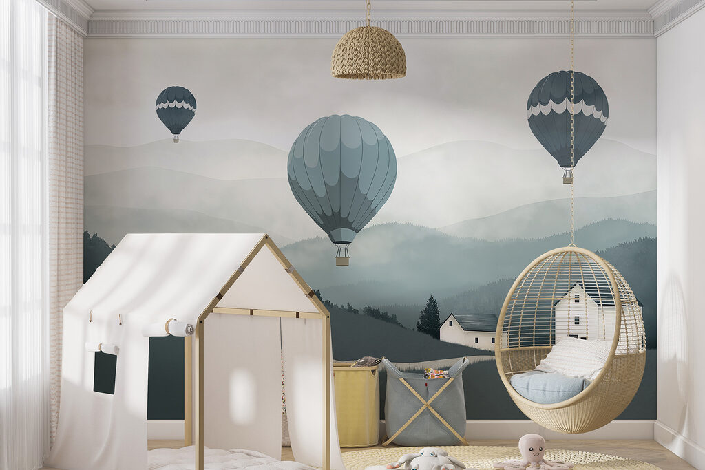 Group of hot air balloons flying over a village Group of hot air balloons flying over a village