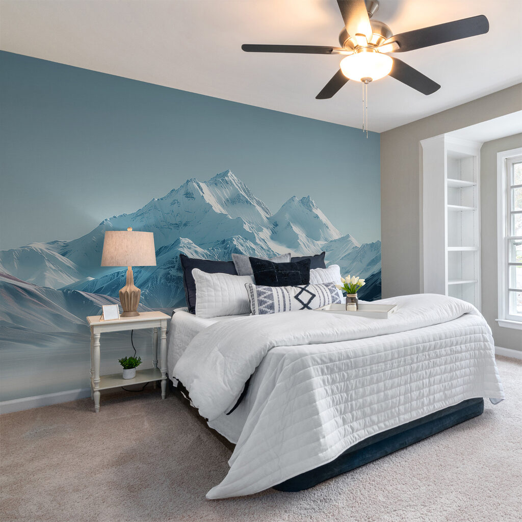 Snowy mountain range with a body of water