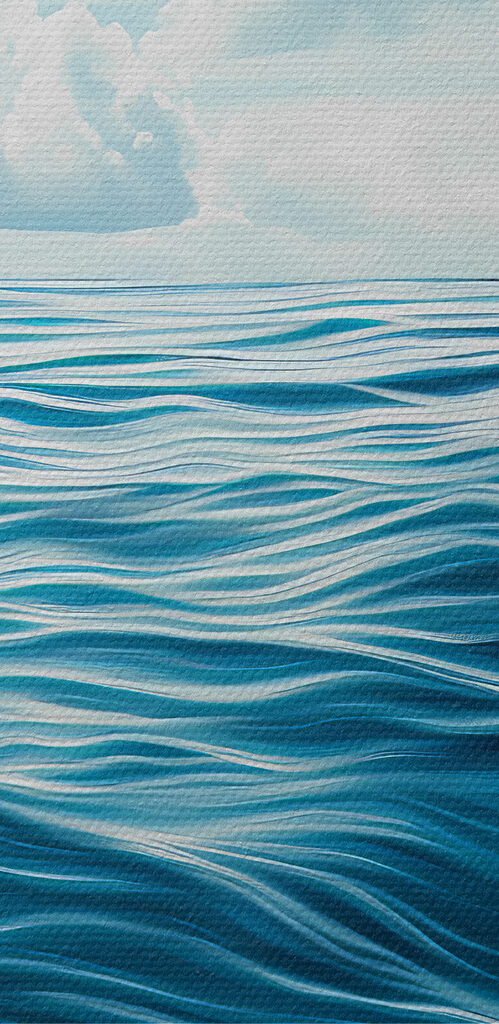 Blue ocean with clouds in the sky