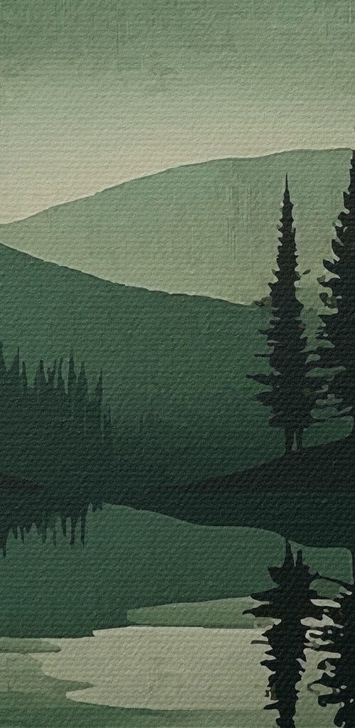 Landscape of mountains and trees and a lake