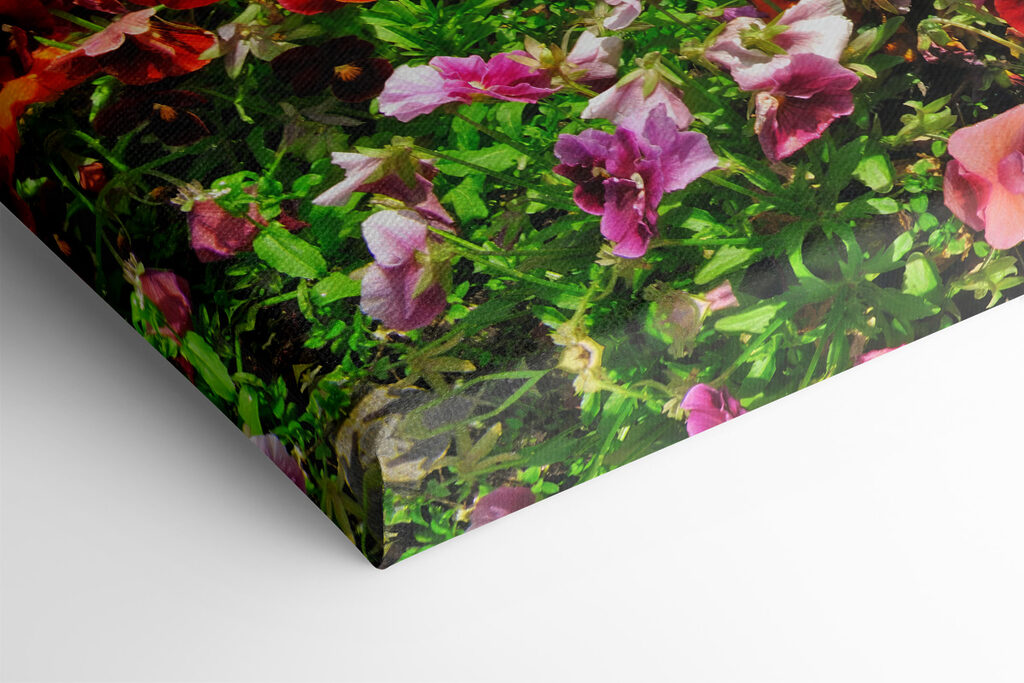 Flower bed with flowers and a lake in the background