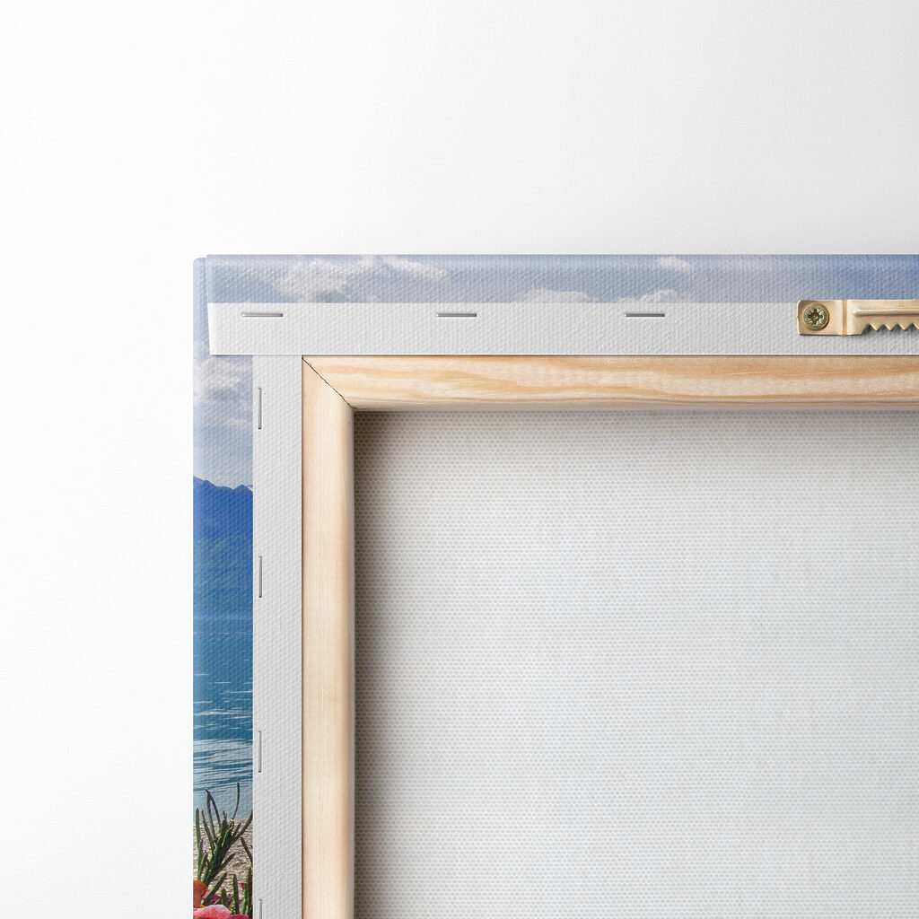 Flower bed with flowers and a lake in the background