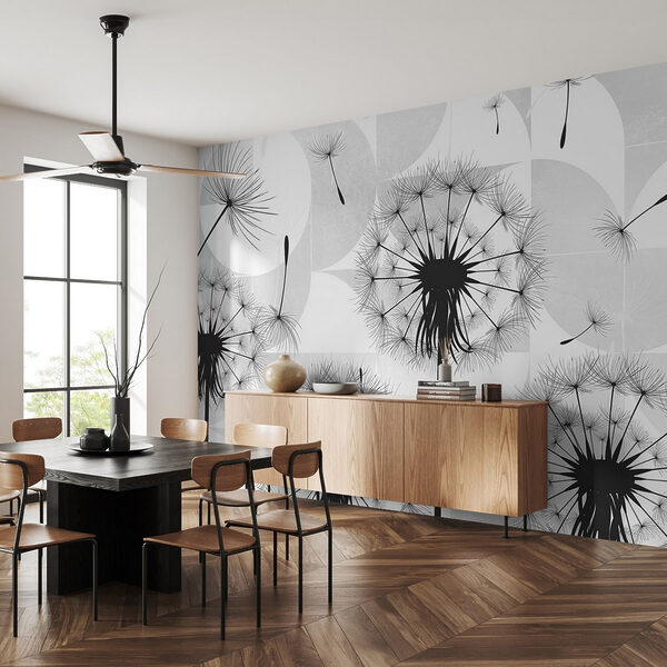 Black dandelion seeds flying in the air