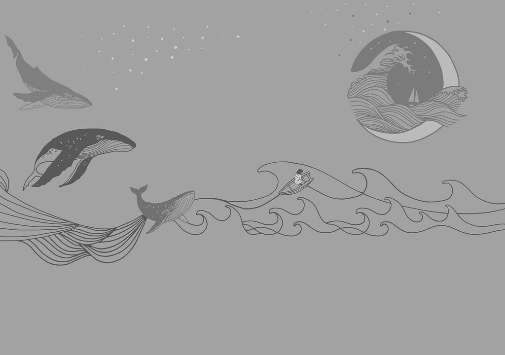 Whale and man in the ocean