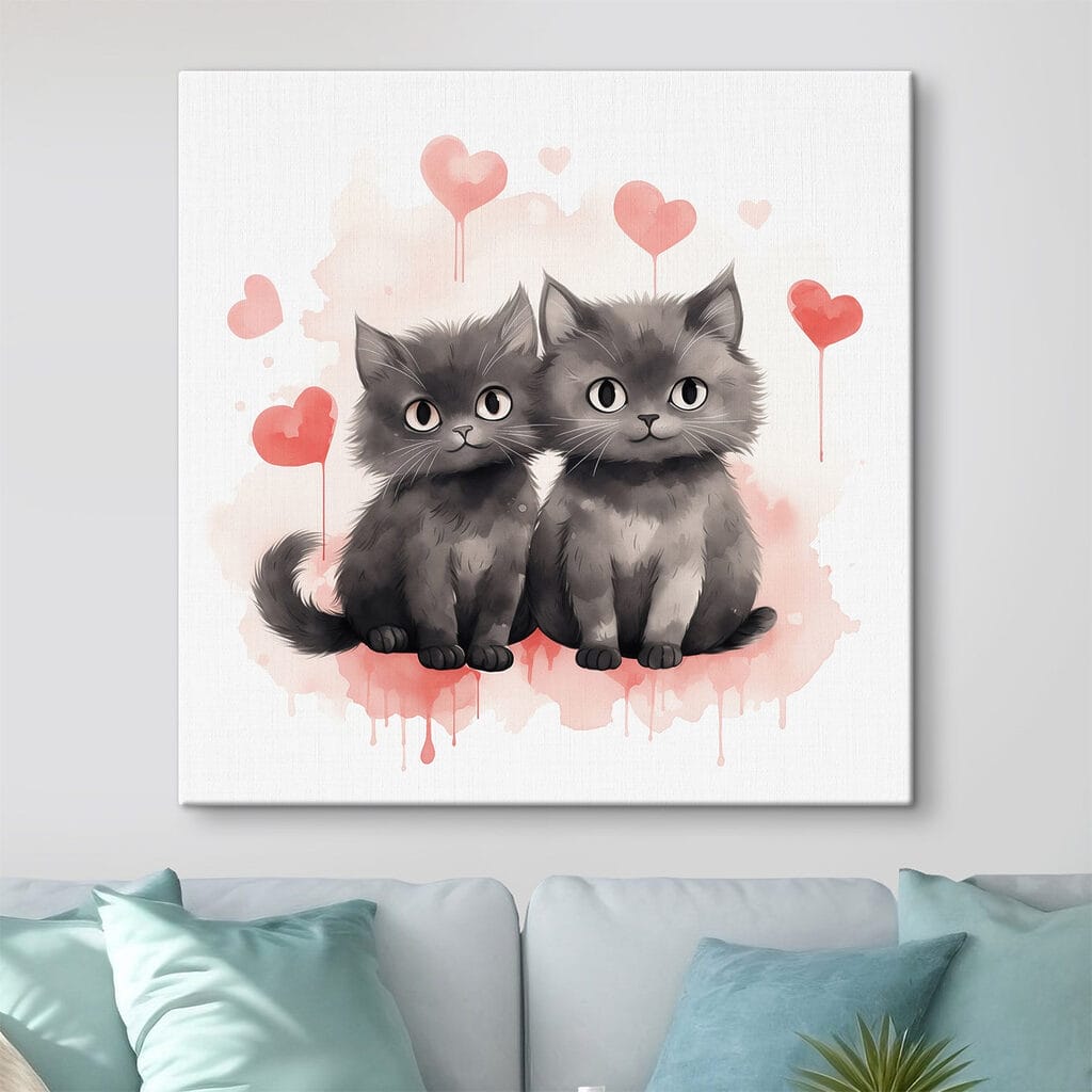 Two cats sitting next to each other