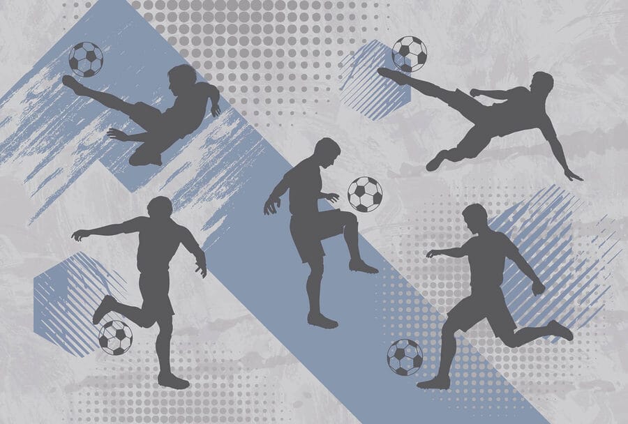 Skupina mužů hrajících fotbal