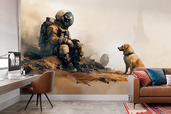 Astronaut sedí na skále a dívá se na psa Astronaut sedí na skále a dívá se na psa