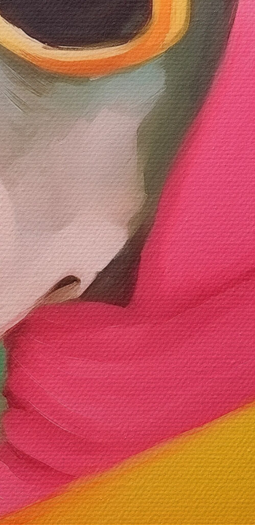 Dog wearing a pink scarf and sunglasses