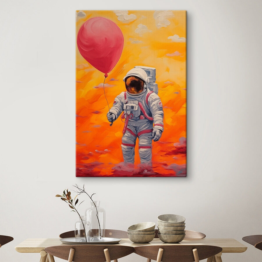 Astronaut držící balón