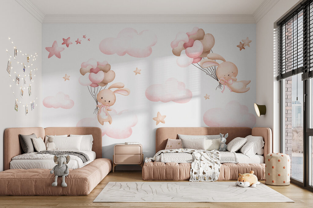 Group of pink clouds and a bunny holding balloons