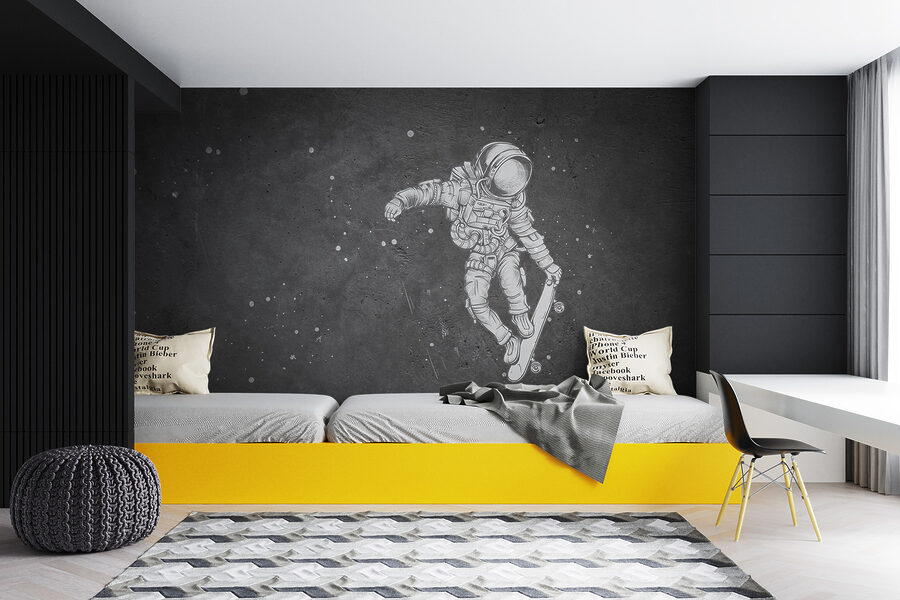 Kresba astronauta na skateboardu
