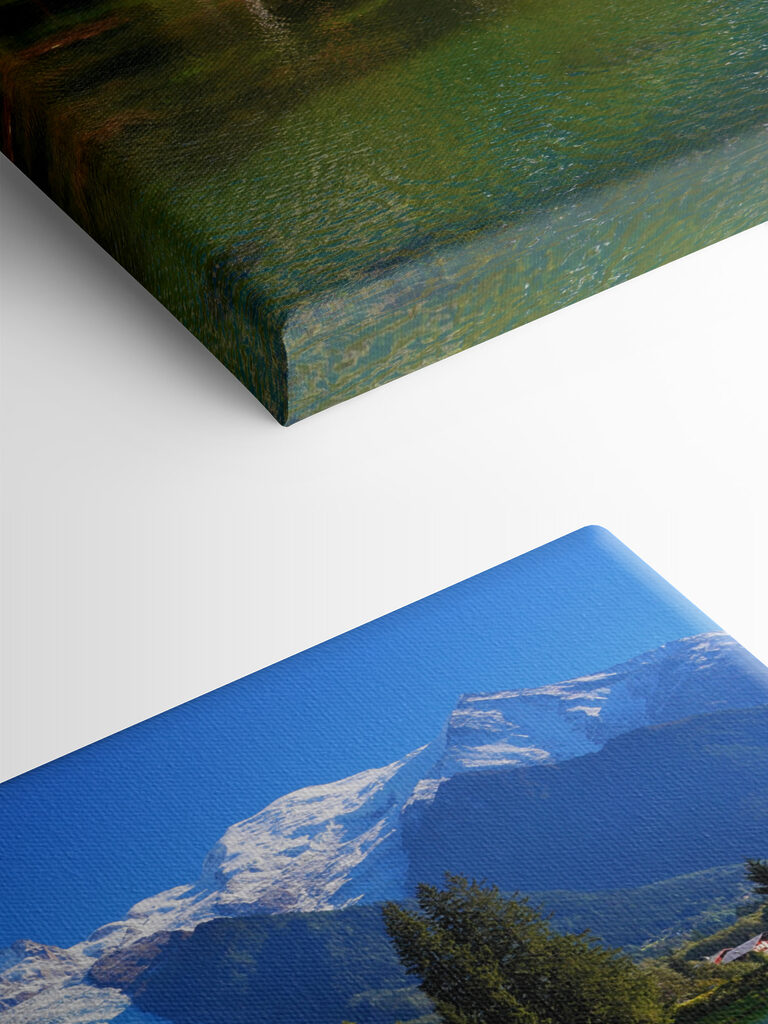 A lake surrounded by trees and mountains