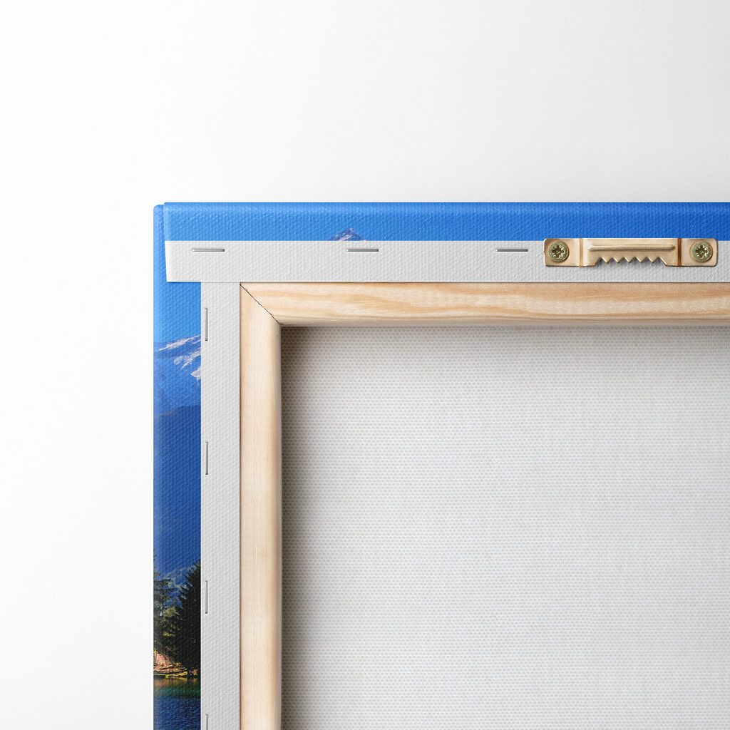 A lake surrounded by trees and mountains