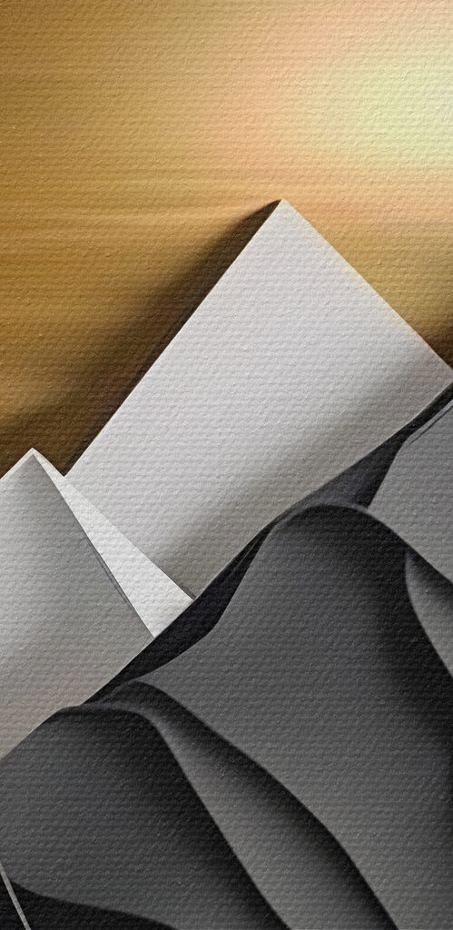 A paper cut out of a mountain landscape